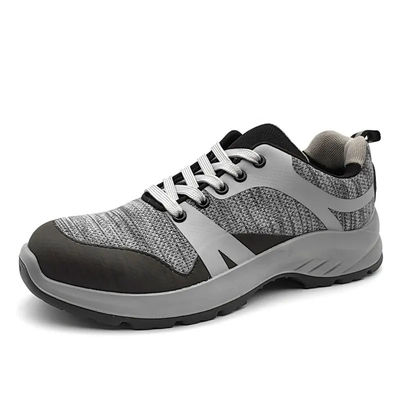 Des chaussures de sport respirantes, de mode, en acier, anti-impact, à tricot à la mouche