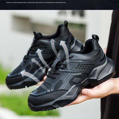 Chaussures de sécurité personnalisées noires durables avec logo, tricot volant en TPU respirant et semelle intermédiaire en Kevlar